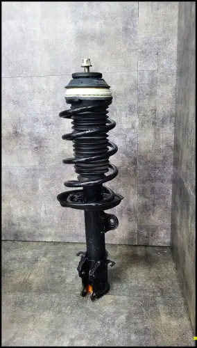 93188957 Federbein vorne links Opel Corsa D OPC / Fiat Punto lll